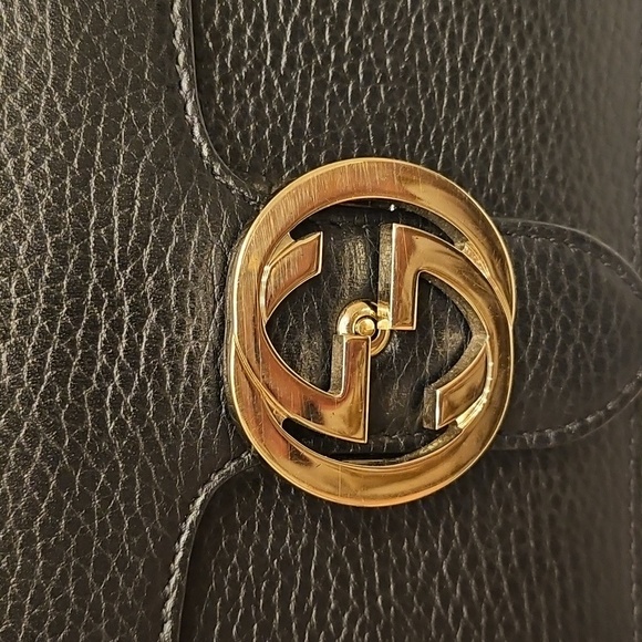 Authentic Gucci Interlock Black Crossbody Bag with Gold Accents - Picture 7 of 13